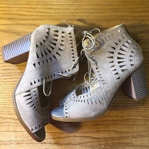 Heel booties with laces.